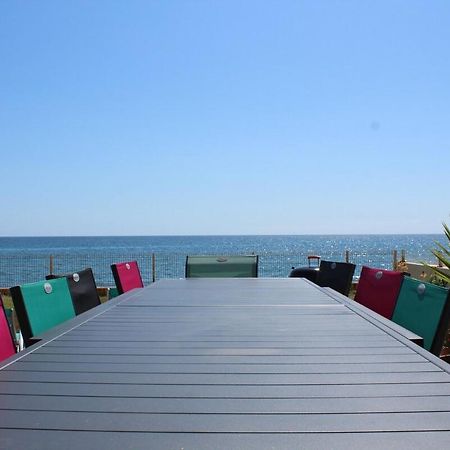 Bord de mer, pieds dans l'eau, vue panoramique Villa San Nicolao Bagian luar foto